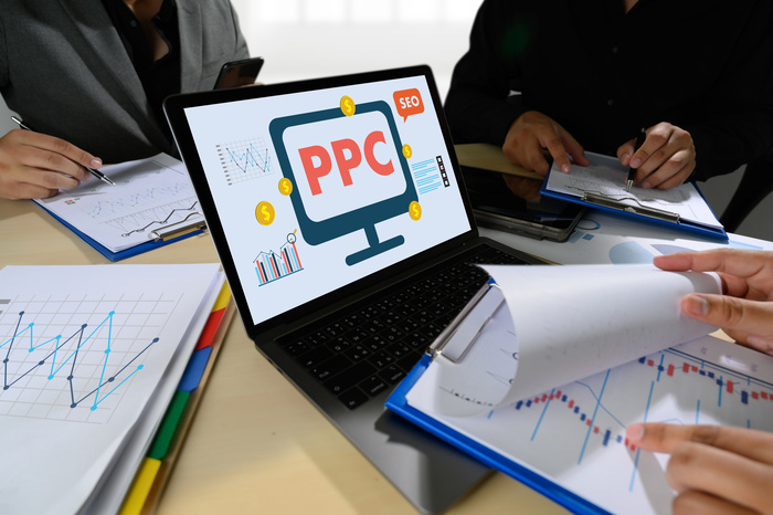 PPC - Pay Per Click concept Businessman working concept.