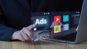 PPC expert setting up ppc ad campaign on laptop